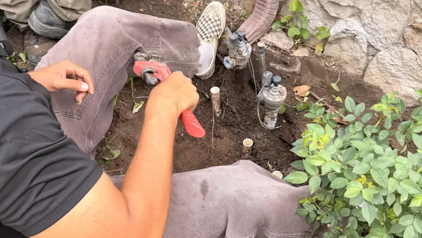 Tightening a fitting on a new valve (ACRE job photo)