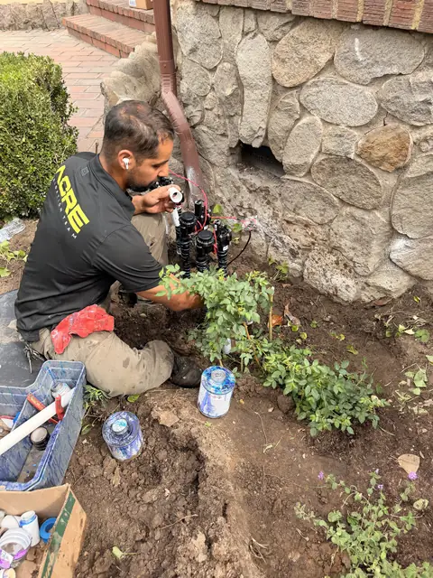 ACRE tech fitting a new valve manifold (ACRE job photo)