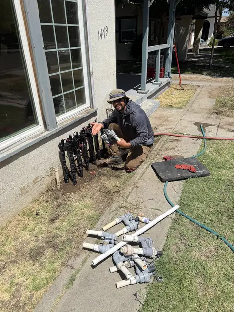 Valve work at the side of a home (ACRE job photo)