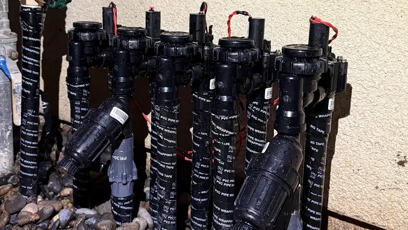 Valve manifold beside a home (ACRE job photo)